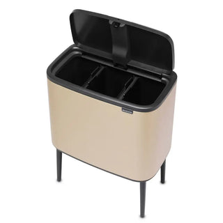 Beige brabantia bo touch bin 11x3l med platsbesparande design och öppet lock