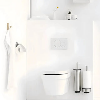 En modern vit vägghängd toalett med dubbelspolning.
