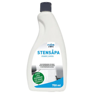 Vit, oregelbundet formad plastflaska med stentvål med mörkgrå kapsyl.