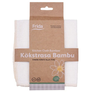 Vit köksduk i bambu i brun kartongförpackning.