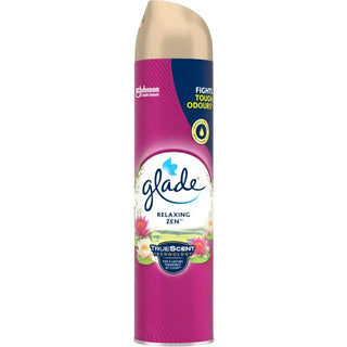 Glade sprayburk med luftfräschare i rosa och guld.