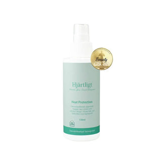 En ljusblå flaska med värmeskyddande spray med en guldfärgad Beauty Oscar-stämpel.
