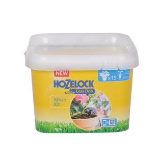 Gul plastbehållare med Hozelock Micro Drip bevattningssats.