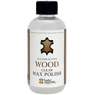 Klar flytande trävaxpolish i flaska med svart lock.
