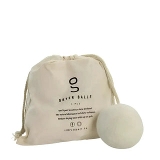 Natural wool dryer balls i en dragkedja väska från SIMPLE GOODS Nya Zeeland städprodukter