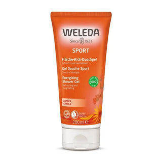Orange tub med Weleda Sport energigivande duschgel med arnica.