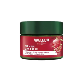 Weleda Day Cream - Förbättrar Elasticitet | 40ml i röd burk med grön lock, innehåller ekologiskt granatäpple och maca-peptider. Perfekt för att minska rynkor och skydda huden mot blåljus.